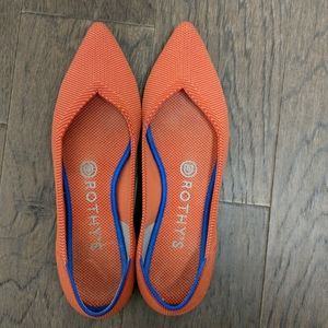 Rothy's pointy-toed flats in persimmon, size 7